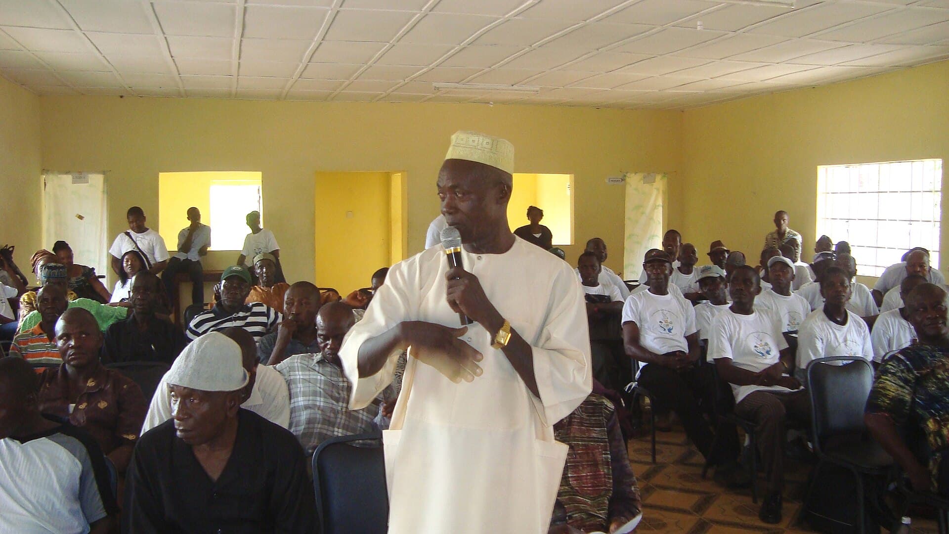 Community members participating in a local meeting